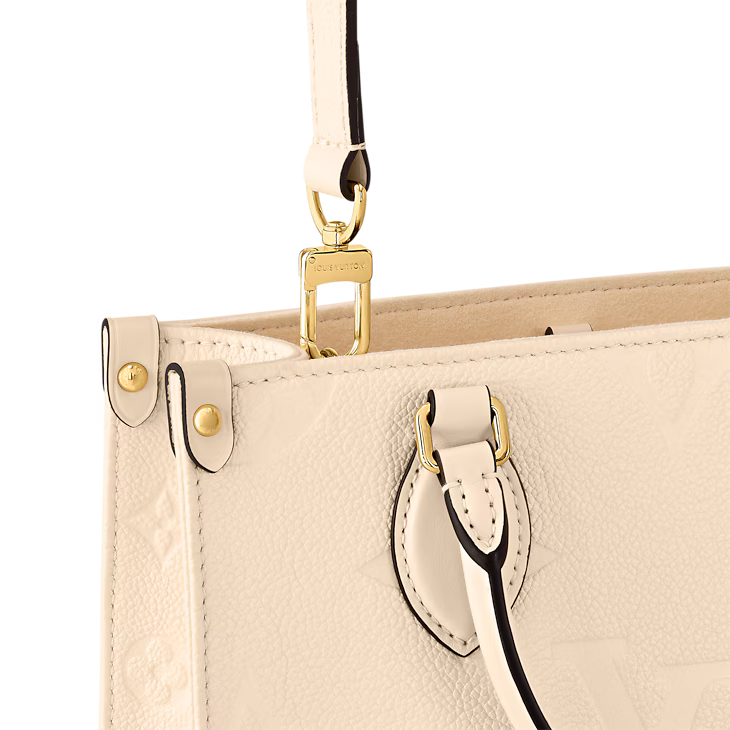 Louis Vuitton Beige
OnTheGo PM